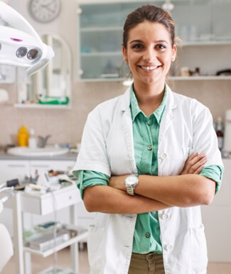 Dentist smiles at patient