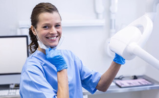 Dental hygienist smiles